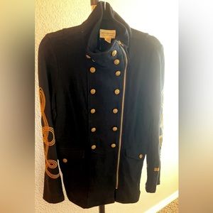 This utility jacket is perfect weight, gold buttons with zipper, gold stitching